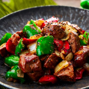 Black Pepper Beef is a classic Chinese stir-fry made with beef, onions, and peppers.