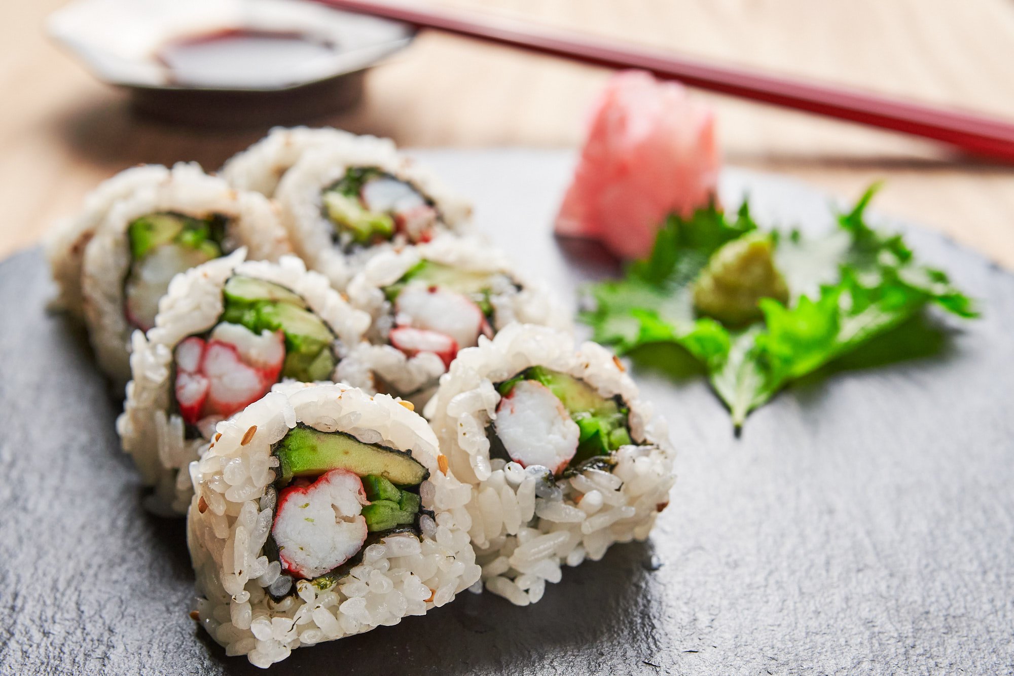 California rolls stuffed with avocado, king crab, and cucumber.