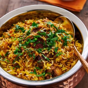 With layers of fragrant, spiced rice and succulent marinated chicken, this chicken biryani is a symphony of flavors and textures in every bite.