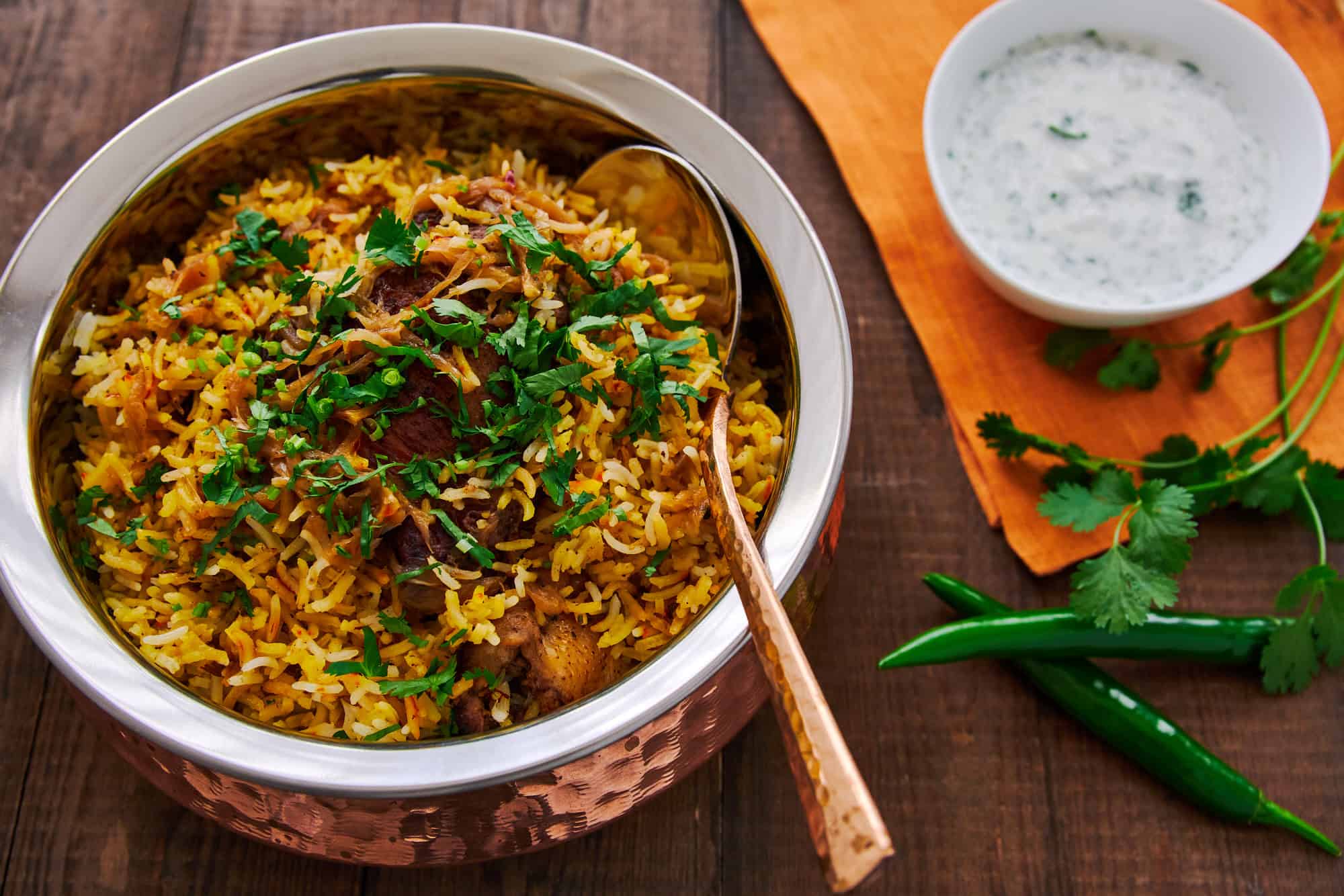 Every mouthful of this sumptuous chicken biryani reveals an explosion of flavor from the perfectly seasoned chicken to the fragrant, spiced rice.
