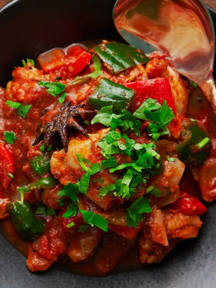 Chicken Jalfrezi with peppers, onions, and tomatoes.