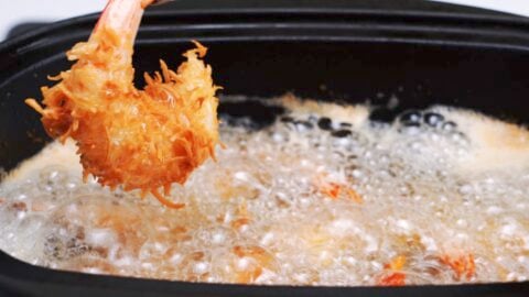 Deep frying coconut shrimp