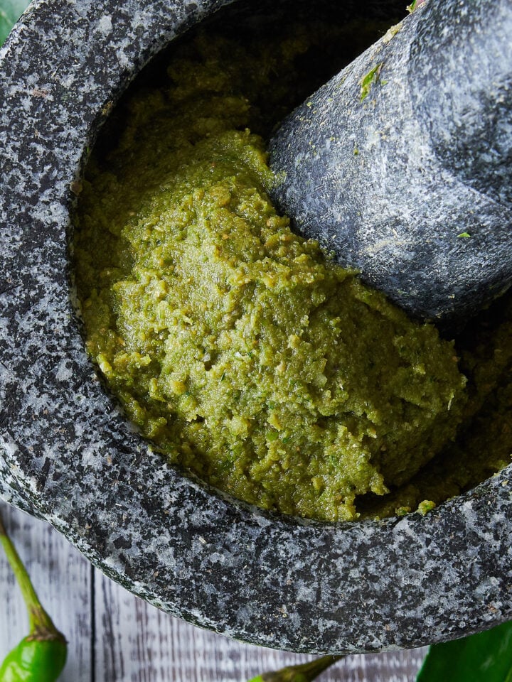 With loads of green herbs and and spices, this green curry paste from scratch is the perfect base for green curry chicken.