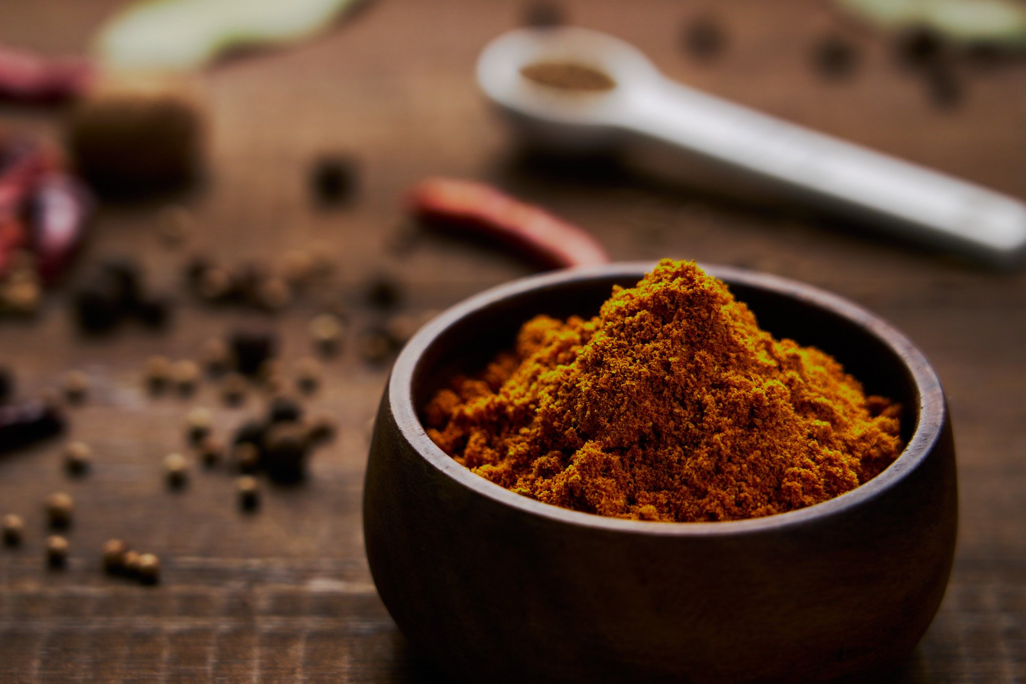 Golden Japanese curry powder made with 20 different spices, including turmeric, cumin, coriander, star anise, citrus zest, dill, and sage.