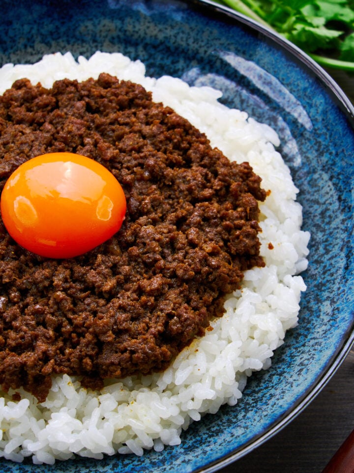 Intensely flavorful and only mildly spicy this Japanese-style ground meat dry curry is topped with a golden yolk.