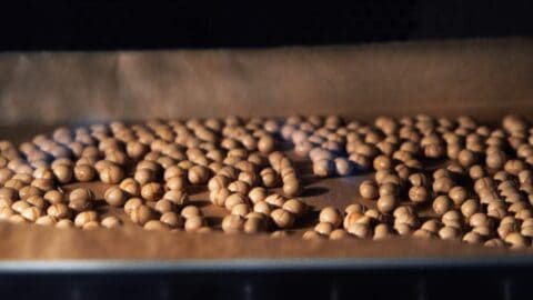 Roasting soybeans until golden brown.