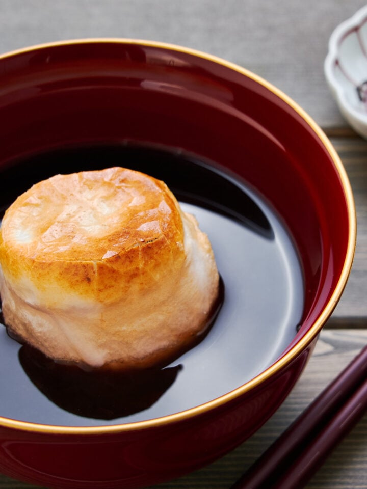 Oshiruko or zenzai is a traditional Japanese dessert soup made with sweet adzuki bean paste and mochi.