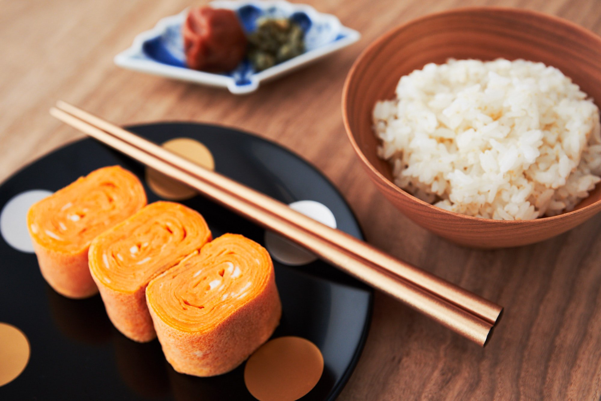 Tamagoyaki is an easy delicious Japanese omelette made by rolling thin layers of seasoned egg into a log. This savory Tamagoyaki recipe is perfect for adding to a bento box lunch.