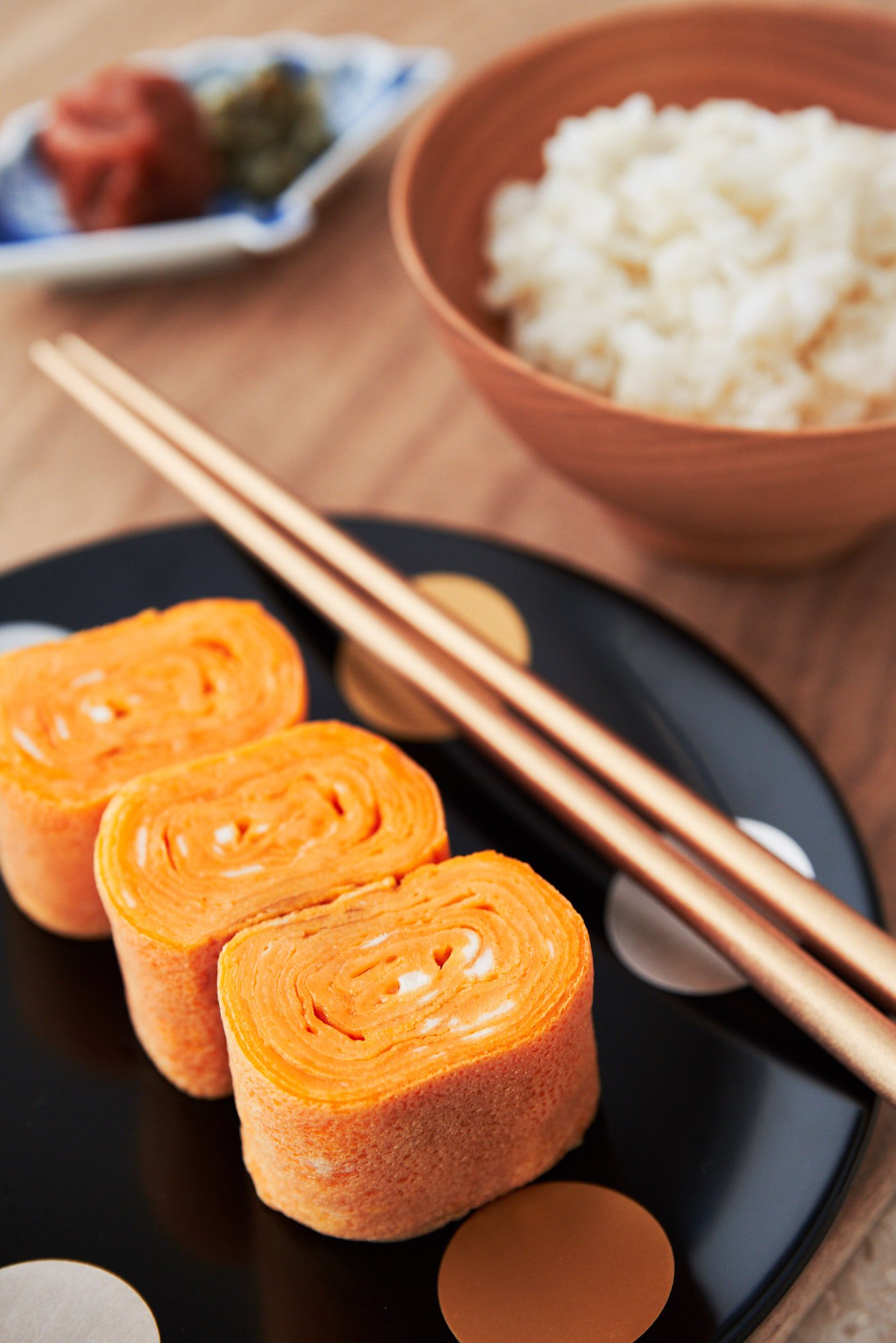 With thin layers of egg rolled into an omelette, Tamagoyaki is a delicious Japanese breakfast dish that also works great into a bento box lunch.
