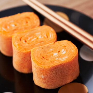Tamagoyaki is a layered Japanese omelette made by rolling thin sheets of seasoned egg into a roll.