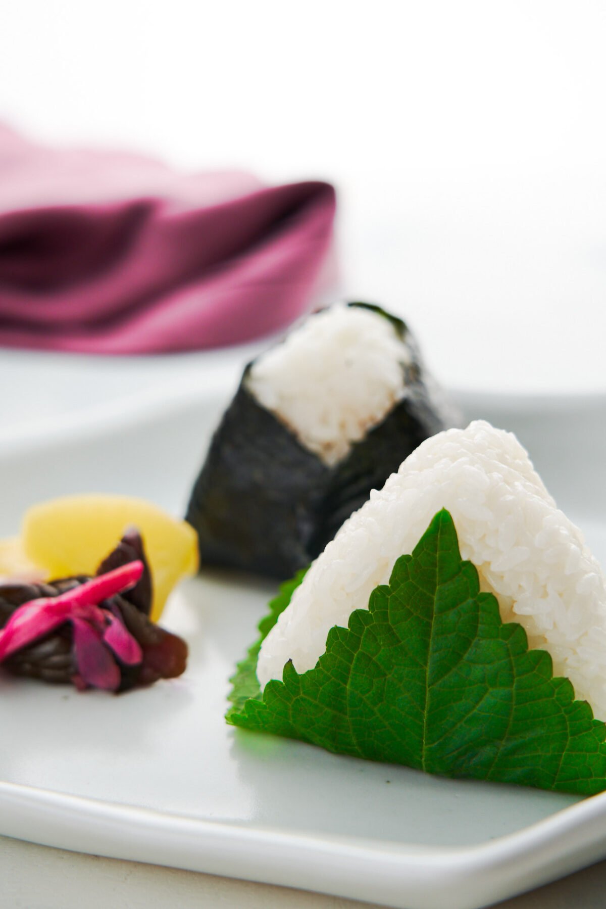 Tuna Mayo is a modern classic filling for onigiri rice balls that can be made with just canned tuna, mayonnaise and soy sauce. Learn everything you need to know to make these triangular Tuna Mayo Onigiri with this recipe.